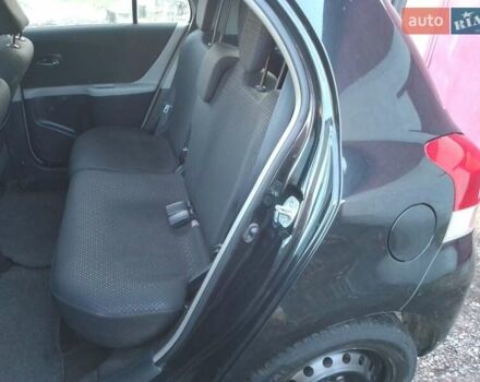 Черный Тойота Ярис, объемом двигателя 1.33 л и пробегом 162 тыс. км за 6500 $, фото 14 на Automoto.ua