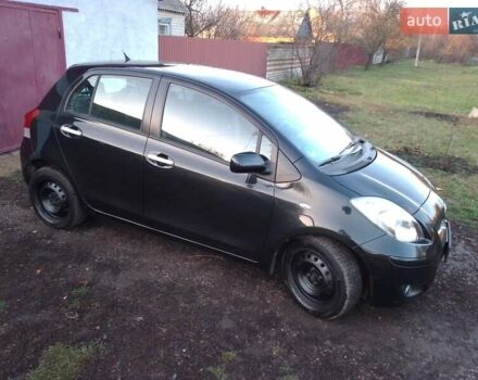 Черный Тойота Ярис, объемом двигателя 1.33 л и пробегом 162 тыс. км за 6500 $, фото 2 на Automoto.ua