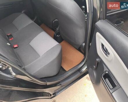 Черный Тойота Ярис, объемом двигателя 1.33 л и пробегом 149 тыс. км за 7600 $, фото 16 на Automoto.ua