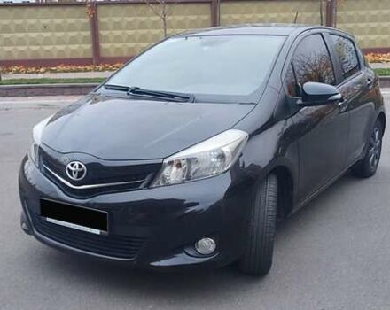 Черный Тойота Ярис, объемом двигателя 1.33 л и пробегом 158 тыс. км за 9500 $, фото 1 на Automoto.ua
