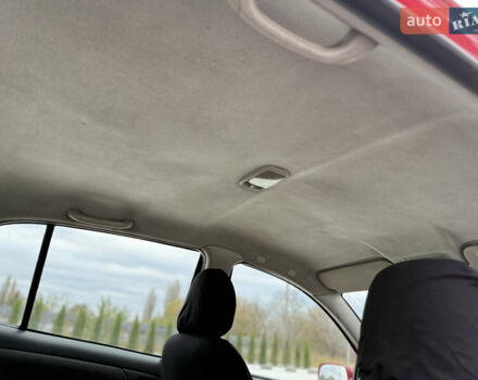 Красный Тойота Ярис, объемом двигателя 1 л и пробегом 240 тыс. км за 2600 $, фото 14 на Automoto.ua