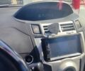 Червоний Тойота Яріс, об'ємом двигуна 1.3 л та пробігом 197 тис. км за 6100 $, фото 3 на Automoto.ua