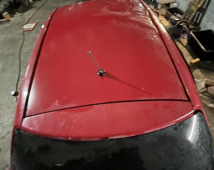 Красный Тойота Ярис, объемом двигателя 1.3 л и пробегом 200 тыс. км за 2400 $, фото 4 на Automoto.ua