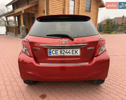 Красный Тойота Ярис, объемом двигателя 1.33 л и пробегом 140 тыс. км за 6700 $, фото 5 на Automoto.ua