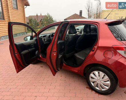 Красный Тойота Ярис, объемом двигателя 1.33 л и пробегом 140 тыс. км за 6700 $, фото 21 на Automoto.ua