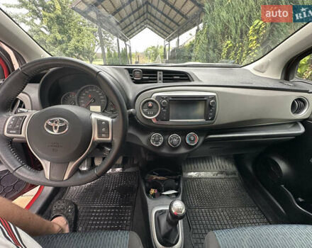 Красный Тойота Ярис, объемом двигателя 1.33 л и пробегом 129 тыс. км за 7300 $, фото 16 на Automoto.ua
