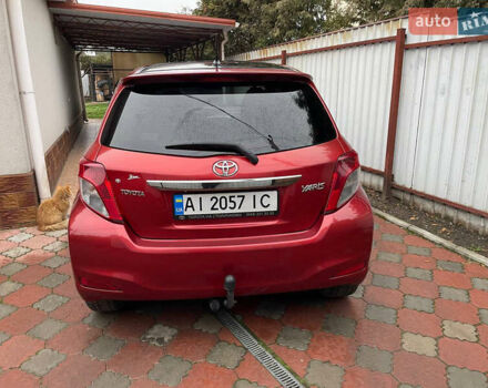Красный Тойота Ярис, объемом двигателя 1.4 л и пробегом 232 тыс. км за 6500 $, фото 5 на Automoto.ua