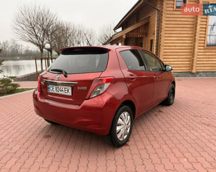 Красный Тойота Ярис, объемом двигателя 1.33 л и пробегом 140 тыс. км за 6700 $, фото 4 на Automoto.ua