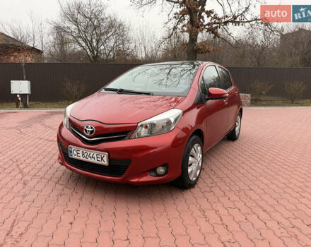 Красный Тойота Ярис, объемом двигателя 1.33 л и пробегом 140 тыс. км за 6700 $, фото 2 на Automoto.ua