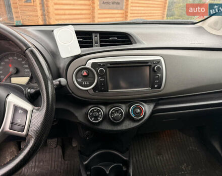 Красный Тойота Ярис, объемом двигателя 1.33 л и пробегом 140 тыс. км за 6700 $, фото 18 на Automoto.ua