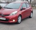 Червоний Тойота Яріс, об'ємом двигуна 1.33 л та пробігом 105 тис. км за 10650 $, фото 1 на Automoto.ua