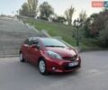 Червоний Тойота Яріс, об'ємом двигуна 1.33 л та пробігом 102 тис. км за 9300 $, фото 1 на Automoto.ua