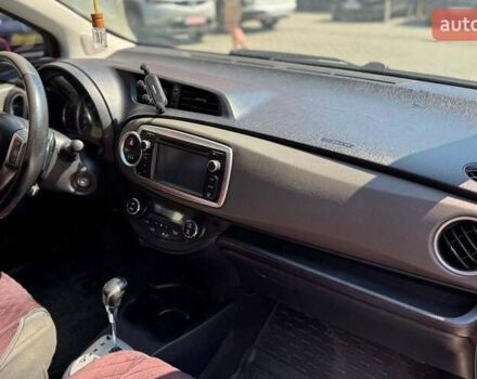 Червоний Тойота Яріс, об'ємом двигуна 1.33 л та пробігом 269 тис. км за 7900 $, фото 12 на Automoto.ua