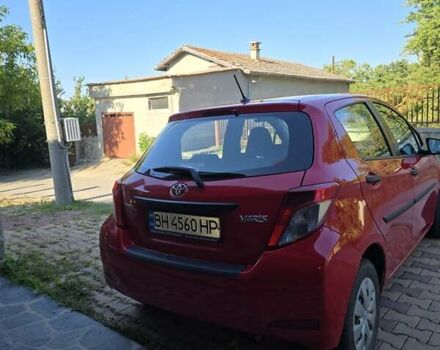 Красный Тойота Ярис, объемом двигателя 1 л и пробегом 108 тыс. км за 9879 $, фото 5 на Automoto.ua