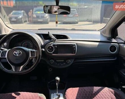 Червоний Тойота Яріс, об'ємом двигуна 1.33 л та пробігом 269 тис. км за 7900 $, фото 10 на Automoto.ua