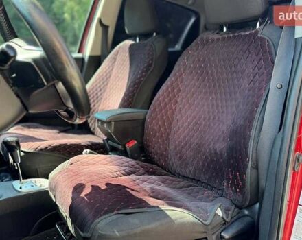 Червоний Тойота Яріс, об'ємом двигуна 1.33 л та пробігом 269 тис. км за 7900 $, фото 8 на Automoto.ua