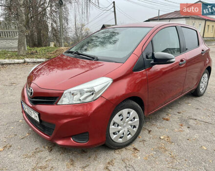 Червоний Тойота Яріс, об'ємом двигуна 1.33 л та пробігом 198 тис. км за 6999 $, фото 6 на Automoto.ua