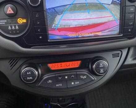 Червоний Тойота Яріс, об'ємом двигуна 1.3 л та пробігом 115 тис. км за 11700 $, фото 4 на Automoto.ua