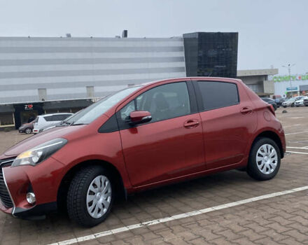 Червоний Тойота Яріс, об'ємом двигуна 1.33 л та пробігом 115 тис. км за 11700 $, фото 1 на Automoto.ua