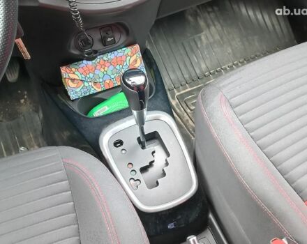 Червоний Тойота Яріс, об'ємом двигуна 1.3 л та пробігом 88 тис. км за 10440 $, фото 16 на Automoto.ua