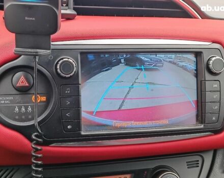 Червоний Тойота Яріс, об'ємом двигуна 1.3 л та пробігом 88 тис. км за 10440 $, фото 26 на Automoto.ua