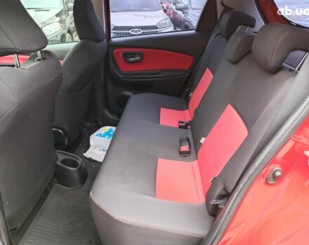 Червоний Тойота Яріс, об'ємом двигуна 1.3 л та пробігом 88 тис. км за 10440 $, фото 11 на Automoto.ua