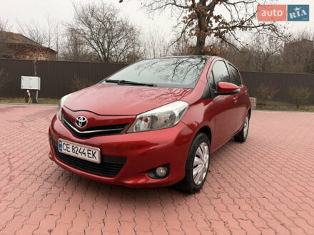Красный Тойота Ярис, объемом двигателя 1.33 л и пробегом 140 тыс. км за 6700 $, фото 1 на Automoto.ua