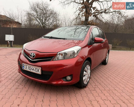 Червоний Тойота Яріс, об'ємом двигуна 1.33 л та пробігом 140 тис. км за 6700 $, фото 1 на Automoto.ua