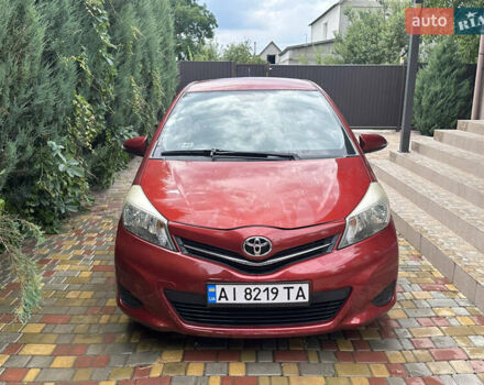Красный Тойота Ярис, объемом двигателя 1.33 л и пробегом 129 тыс. км за 7300 $, фото 1 на Automoto.ua