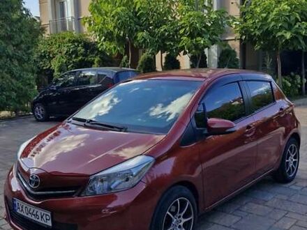 Червоний Тойота Яріс, об'ємом двигуна 1.33 л та пробігом 104 тис. км за 9900 $, фото 1 на Automoto.ua