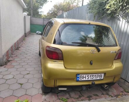 Желтый Тойота Ярис, объемом двигателя 1 л и пробегом 320 тыс. км за 2700 $, фото 3 на Automoto.ua