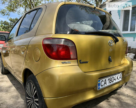 Желтый Тойота Ярис, объемом двигателя 1.3 л и пробегом 250 тыс. км за 3500 $, фото 6 на Automoto.ua