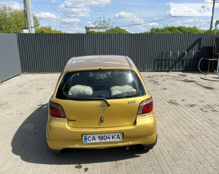 Желтый Тойота Ярис, объемом двигателя 1.3 л и пробегом 250 тыс. км за 3500 $, фото 20 на Automoto.ua