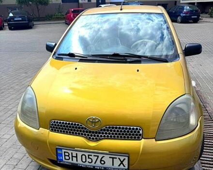 Желтый Тойота Ярис, объемом двигателя 1.3 л и пробегом 250 тыс. км за 3500 $, фото 2 на Automoto.ua