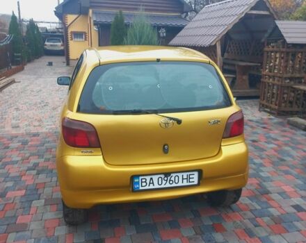 Желтый Тойота Ярис, объемом двигателя 1.3 л и пробегом 250 тыс. км за 3700 $, фото 4 на Automoto.ua