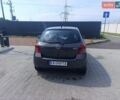 Серый Тойота Ярис, объемом двигателя 1.3 л и пробегом 170 тыс. км за 5600 $, фото 1 на Automoto.ua