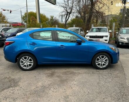 Синій Тойота Яріс, об'ємом двигуна 1.5 л та пробігом 170 тис. км за 12790 $, фото 4 на Automoto.ua