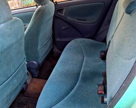 Зеленый Тойота Ярис, объемом двигателя 1 л и пробегом 254 тыс. км за 3000 $, фото 4 на Automoto.ua