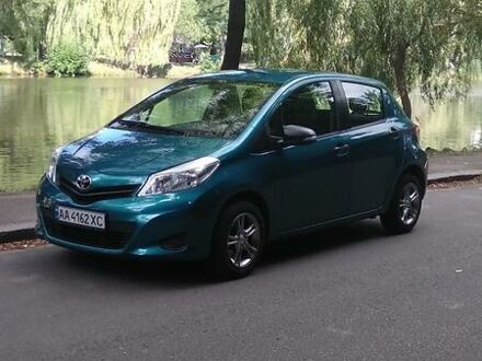 Зеленый Тойота Ярис, объемом двигателя 1 л и пробегом 120 тыс. км за 7500 $, фото 1 на Automoto.ua
