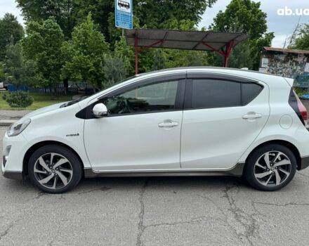 Білий Тойота Aqua, об'ємом двигуна 1.5 л та пробігом 95 тис. км за 11990 $, фото 6 на Automoto.ua