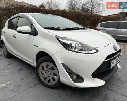 Белый Тойота Aqua, объемом двигателя 1.5 л и пробегом 63 тыс. км за 11300 $, фото 2 на Automoto.ua