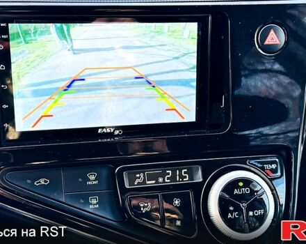 Білий Тойота Aqua, об'ємом двигуна 1.5 л та пробігом 53 тис. км за 12700 $, фото 4 на Automoto.ua