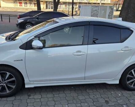 Белый Тойота Aqua, объемом двигателя 1.5 л и пробегом 51 тыс. км за 12800 $, фото 6 на Automoto.ua