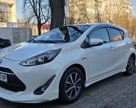 Белый Тойота Aqua, объемом двигателя 1.5 л и пробегом 51 тыс. км за 12800 $, фото 1 на Automoto.ua
