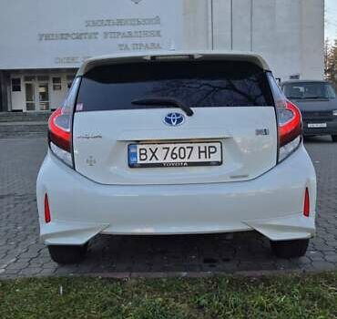 Белый Тойота Aqua, объемом двигателя 1.5 л и пробегом 51 тыс. км за 12800 $, фото 4 на Automoto.ua