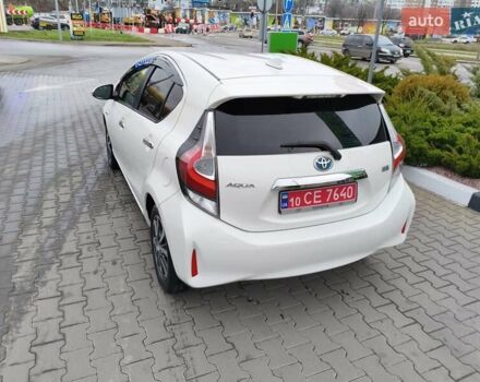 Белый Тойота Aqua, объемом двигателя 1.5 л и пробегом 73 тыс. км за 12800 $, фото 11 на Automoto.ua