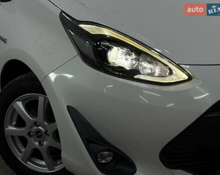 Білий Тойота Aqua, об'ємом двигуна 1.5 л та пробігом 87 тис. км за 13200 $, фото 3 на Automoto.ua