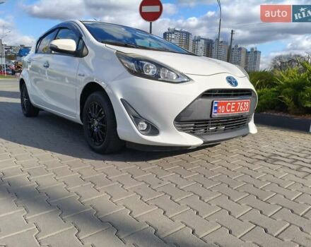 Белый Тойота Aqua, объемом двигателя 1.5 л и пробегом 73 тыс. км за 12900 $, фото 1 на Automoto.ua