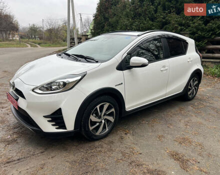 Белый Тойота Aqua, объемом двигателя 1.5 л и пробегом 61 тыс. км за 13200 $, фото 12 на Automoto.ua