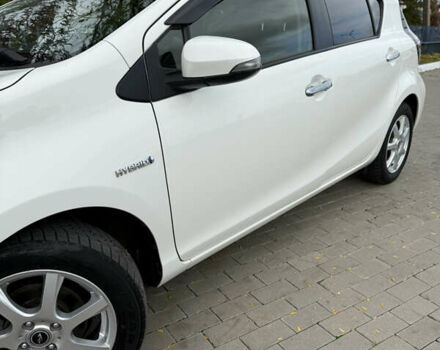 Білий Тойота Aqua, об'ємом двигуна 1.5 л та пробігом 86 тис. км за 12800 $, фото 16 на Automoto.ua